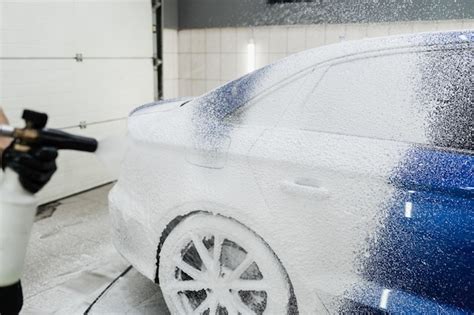 Process of spraying foam on the car body in the garage second phase of ...