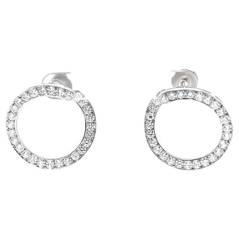 TIFFANY and CO. Etoile Platinum and Diamond Pave Hoop Earrings at 1stDibs