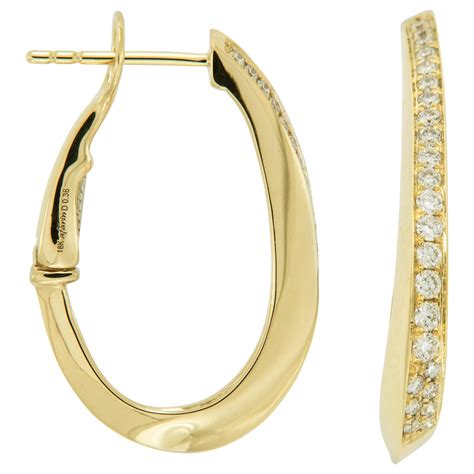 Diamond and 18 Karat Yellow Gold Mini Hoop Earrings For Sale at 1stDibs