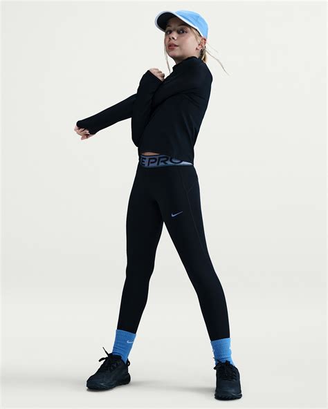 Nike Pro Older Kids' (Girls') Dri-FIT Leggings with Shine Accents. Nike IN