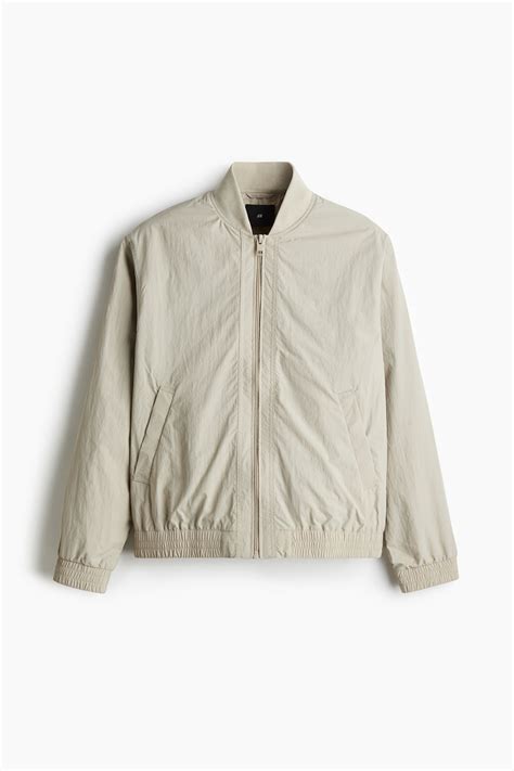 Regular Fit Nylon bomber jacket - Light beige - Men | H&M IN