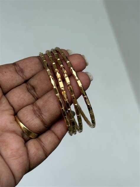 Ph064 set of 4 gold replica panchaloham bangles – yuvicollections.com