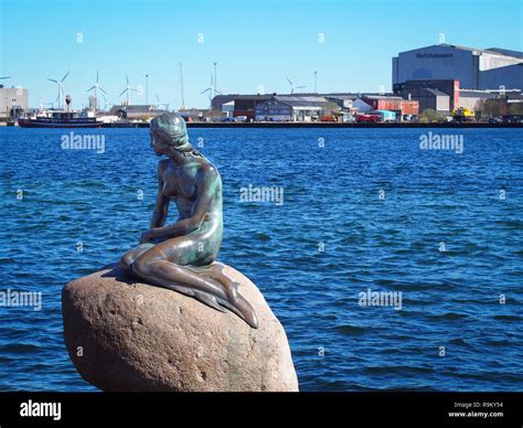 COPENHAGEN, DENMARK-APRIL 11, 2016: Bronze statue of the Little Mermaid ...