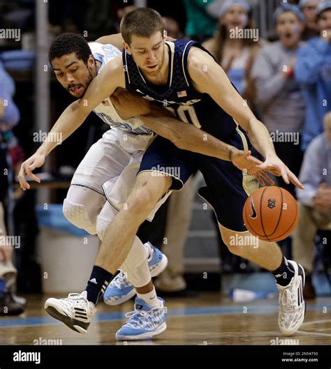 North Carolina's James Michael McAdoo, left, and Notre Dame's Austin ...