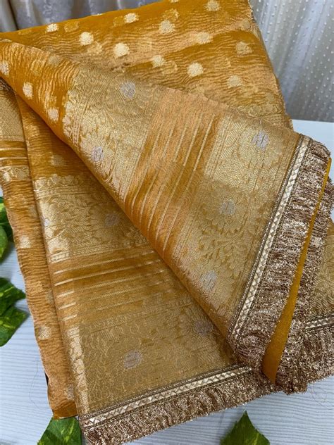 GOLDEN YELLOW SOFT CRUSH TISSUE SAREE WITH ZHALA LACE – Theja Couture