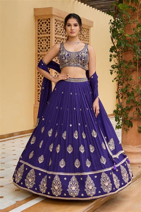 Navy blue silk lehenga choli with golden thread embroidery and sequins