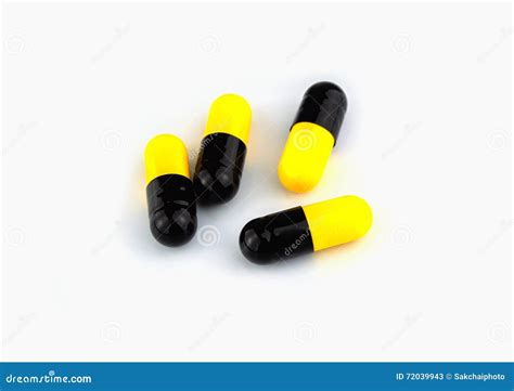 Pills Yellow and Black Capsules Isolated on White Background Stock ...