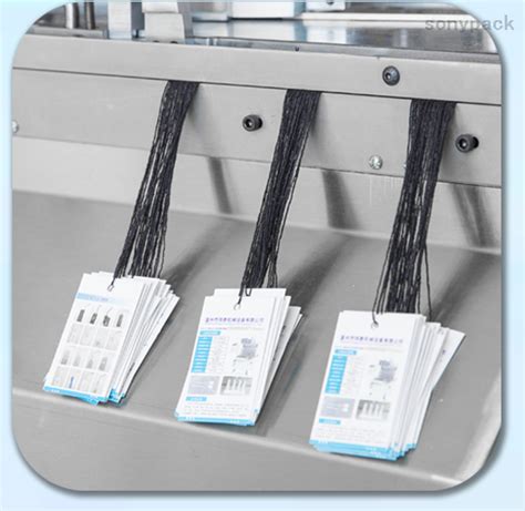 Image result for Tag Stringing Machine