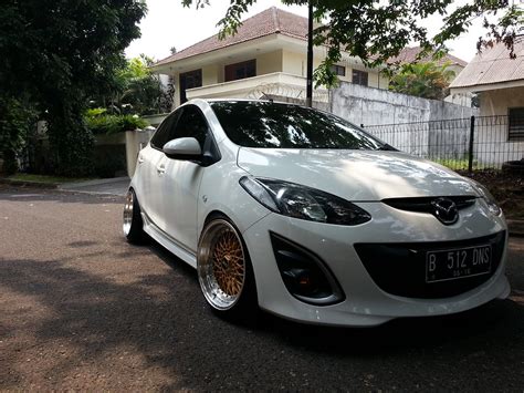 Mazda2 with deep dish staggered rims & slammed! How do i do this ...