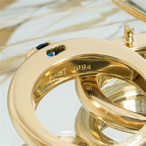 Piaget Yellow Gold Sapphire & Diamond Double Ring | Rich Diamonds