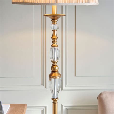 Polina antique brass floor light teamed with a beige organza effect shade