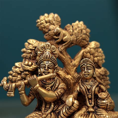 Divine love and devotion shared between Lord Krishna and Radha Idol In