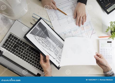 Architects Working on Blueprint, Real Estate Project. Architect ...