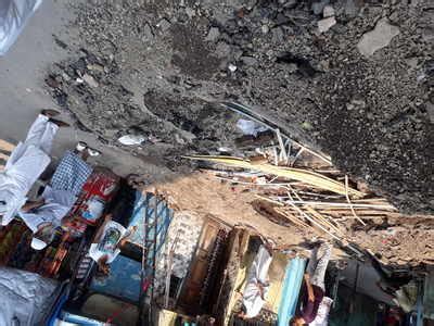 illegal deep dig up of the road by the goon - Times of India