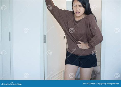 Asian Woman Having Painful Stomachache and Diarrhea in Front of Toilet Bowl after Wake Up ...