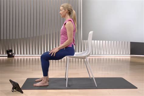 6 Chair Yoga Poses to Practice Anywhere | The Output by Peloton