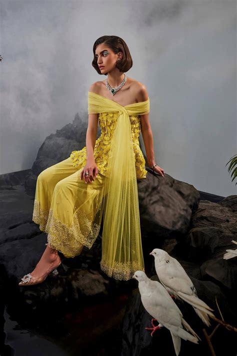 Feather Embellished Peplum Top With Wide Legged Trousers And Shoulder ...
