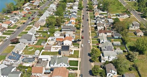 Premium Photo | Top down aerial view of an urban area in a small town ...