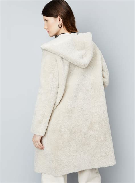 Buy Women Reversible Faux Fur Hooded Coat Online at just Rs. 3499.0 ...