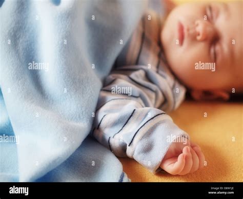 Sleeping four week old baby Stock Photo - Alamy