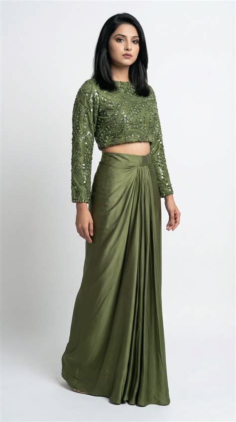 Mehendi ceremony outfits at Rosio House, Noida — green lehengas, floral ...
