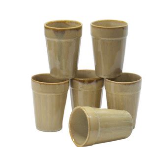 ST "REDEFINING SPACES" Ceramic Hand Glazed Brown Colour Ceramic Cutting ...