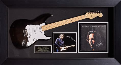 Eric Clapton Signed Album Cover and Replica Guitar – Sevyn