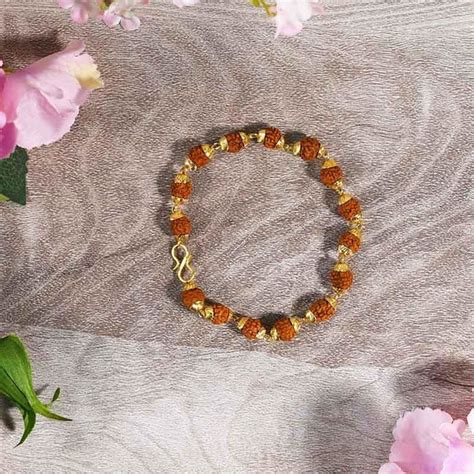 Buy Five faces Rudraksha Bracelet with Golden Caps Online in India ...