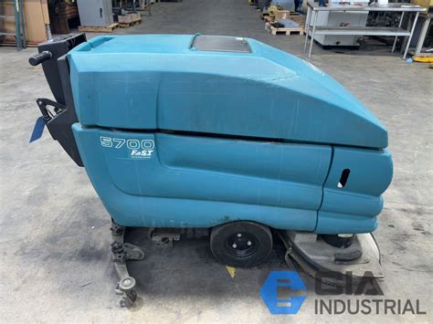 TENNANT MODEL 5700 ELECTRIC WALK BEHIND FLOOR SCRUBBER; S/N 5700-22537 ...