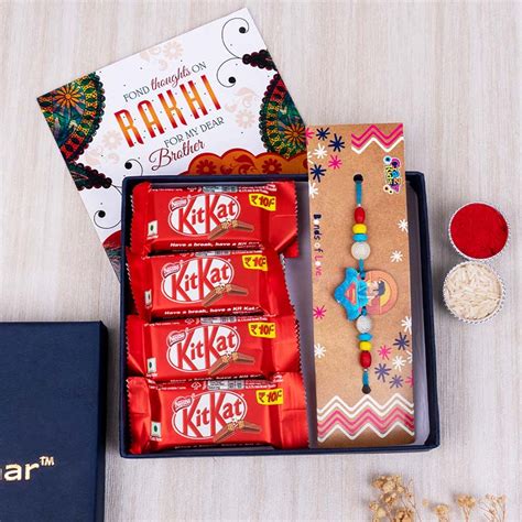 Send Superman Rakhi with Kit Kat and Rakhi Card Online | Rakhibazaar.com