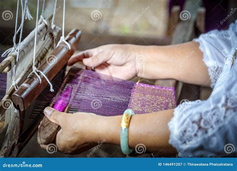 Traditional Isan Thai Silk Weaving. Old Woman Hand Weaving Silk in ...