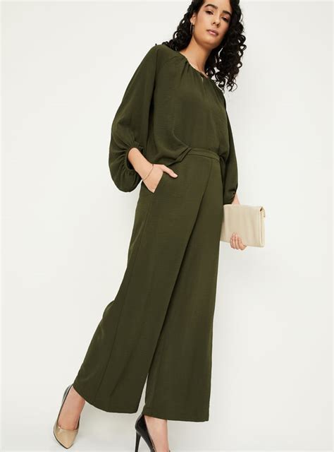 Buy Women Solid Wide Leg Trousers Online at just Rs. 899.0 ...