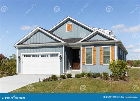 Dark Blue Siding with Wood Shutters: The Perfect Combination for Your ...