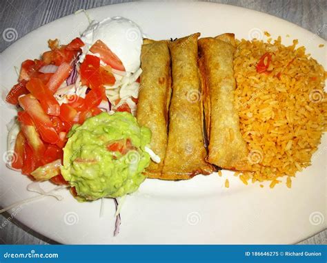 Beef Flautas Mexican Food for Dinner Stock Image - Image of food, cream ...