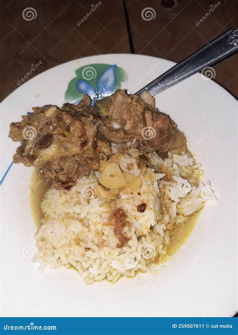 Indonesian Traditional Food, Goat Curry with Rice and Soy Sauce Stock ...