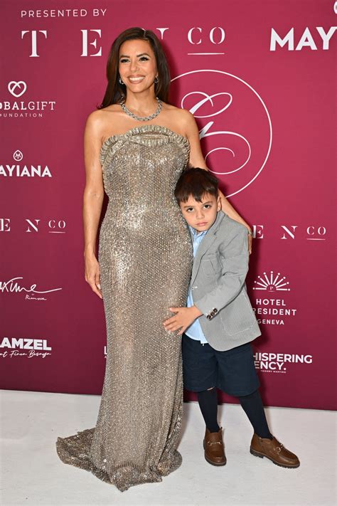 Eva Longoria pours curves into slinky fitted gown for red carpet appearance with lookalike son ...