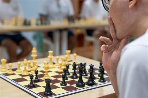 Singapore Chess Federation CEO Kevin Goh Wei Ming teaches chess at ...