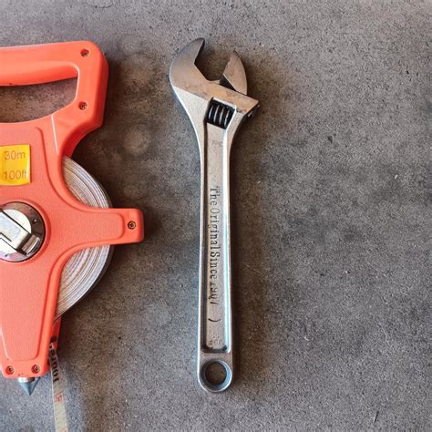 100 ft MEASURING TAPE, 10" CRECENT WRENCH, C-CLAMP AND PIPE WRENCH ...