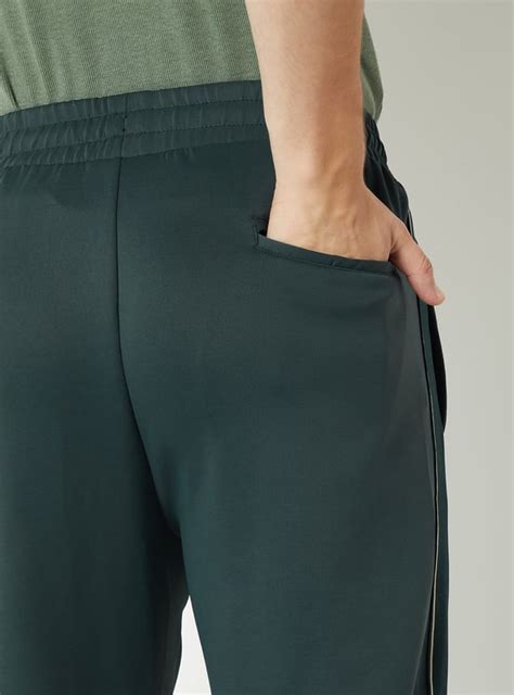 Buy Men Side Tape Athleisure Track Pants Online at just Rs. 1299.0 ...