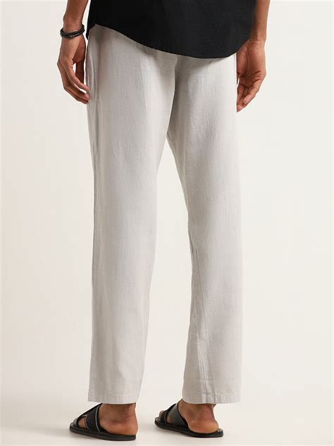 Buy ETA Grey Relaxed Fit Mid Rise Cotton Blend Chinos from Westside