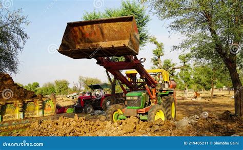 Image result for Operating a Tractor with a Loader