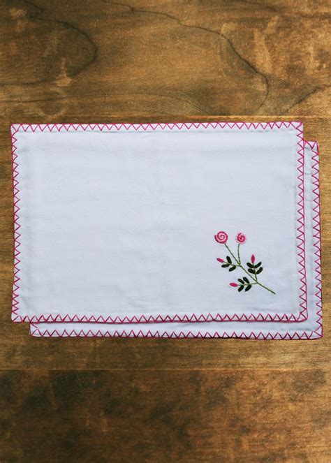 Get Set of 2 - Ivory Hand Embroidered Cotton Table Mats at ₹ 999 | LBB Shop