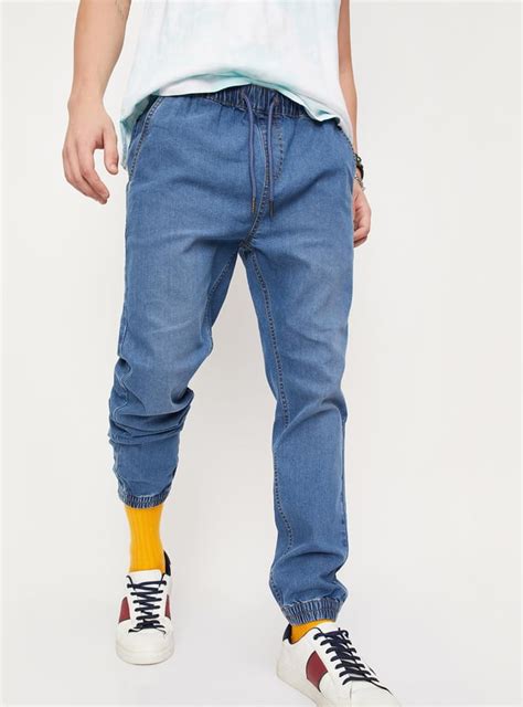 Buy Men Washed Carrot Fit Jogger Jeans Online at just Rs. 1399.0 ...