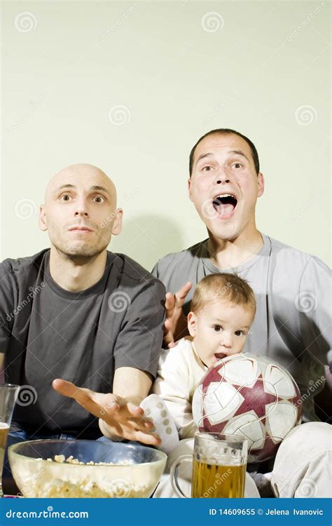 Two Men and Little Boy Watching Television Stock Image - Image of ...