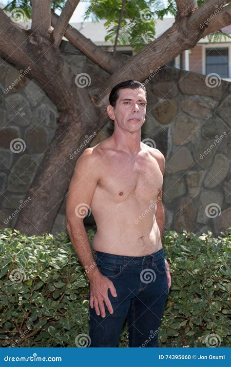 Arms Down for a Barrel Chest Stock Photo - Image of chest, serious ...