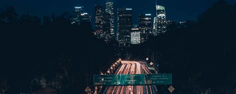 Download wallpaper 2560x1024 road, city, aerial view, night, long ...