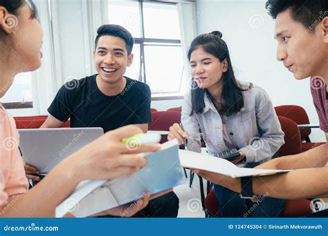 Small University Students Group Study and Discussion Together. Stock ...