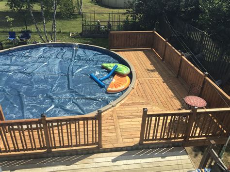 Wrap around deck for above ground pool. Just finished it last week ...