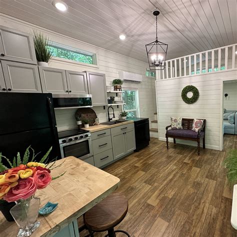 Farmhouse-Style Tiny Home on Wheels with Amazingly Functional Floor ...