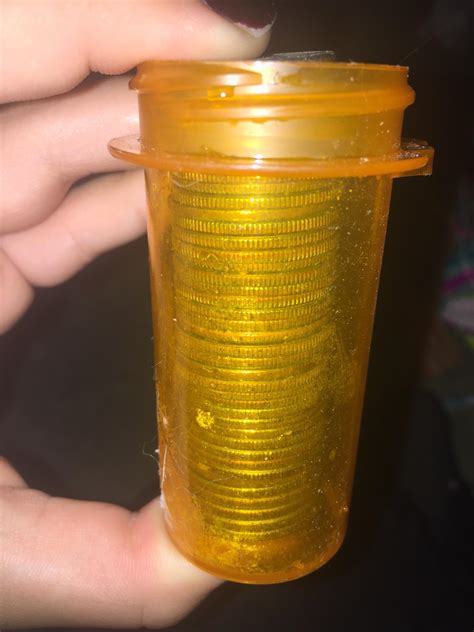 a pharmacy bottle perfectly holds $10 in quarters (exactly enough for a ...